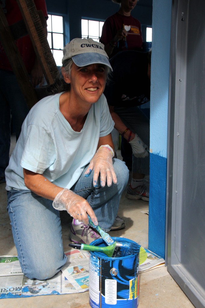 Suzanne painting the new school in Chisunuc